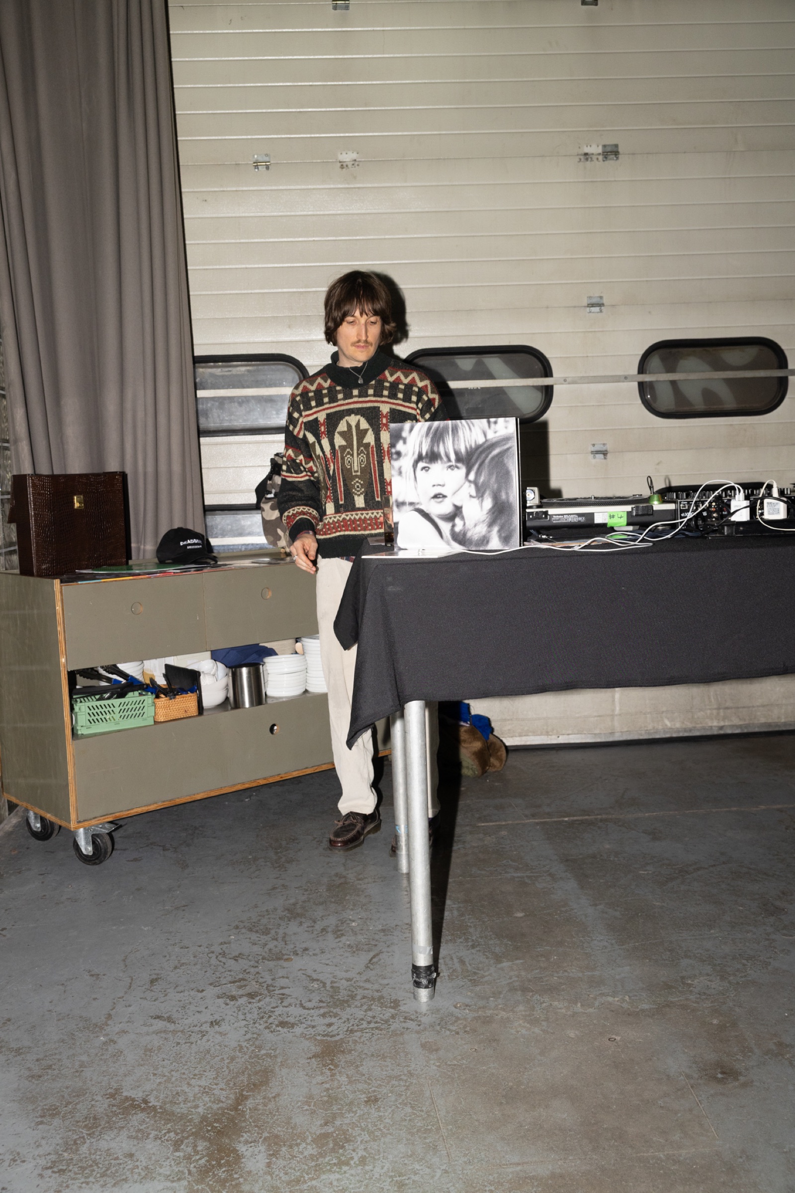 Custom95 merchandise photographed at the Tame Impala release party
